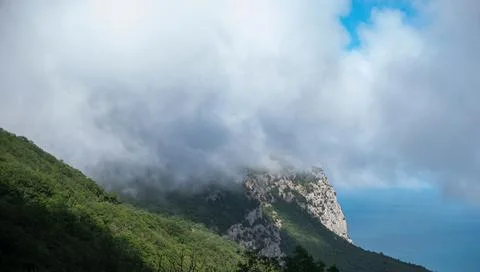 Mountain landscape, clouds low on the mountain Stock Photos