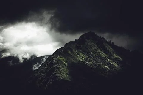 Mountain landscape with dark clouds Stock Photos