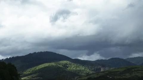Mountain landscape with dramatic clouds Stock Photos
