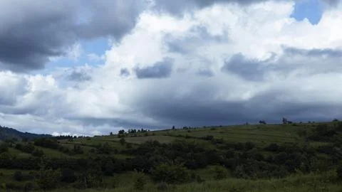 Mountain landscape with dramatic clouds Stock Photos