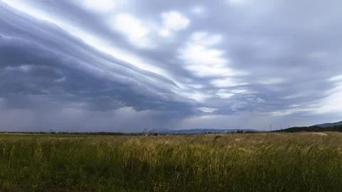 Mountain landscape with dramatic clouds Stock Photos