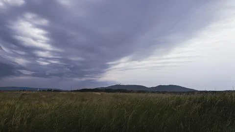 Mountain landscape with dramatic clouds Stock Photos