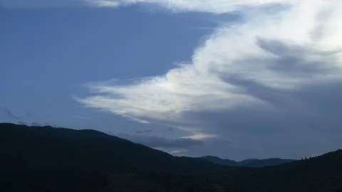Mountain landscape with dramatic clouds Stock Photos