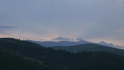 Mountain landscape with dramatic clouds Stock Photos