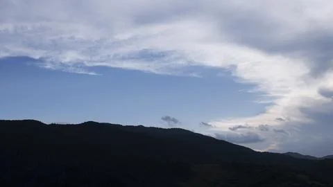 Mountain landscape with dramatic clouds Stock Photos