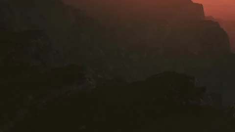 Mountain landscape during sunset with shadows and light patterns Stock Footage 340230604