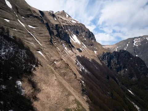 Mountain landscape flying around the mountain peaks in a national park Stock Footage 75187960