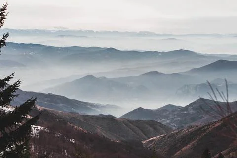 Mountain landscape with fog Stock Photos