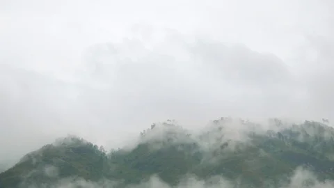 Mountain Landscape Full of Slow Clouds Stock Footage 74924845