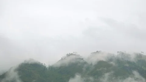 Mountain Landscape Full of Slow Clouds Stock Footage 74932541