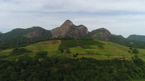 MOUNTAIN IN LANDSCAPE WITH GREEN FOREST Stock Footage 101308316