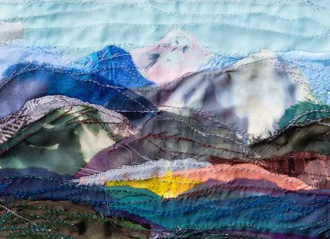 Mountain landscape hand-stitched with patchwork Stock-Fotos