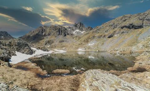 Mountain landscape with lake processed in post production sky not real Stock Photos
