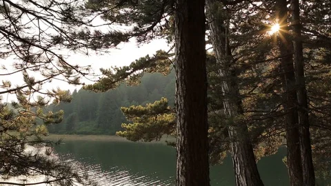 Mountain landscape with lake at sunset Video stock 115075384