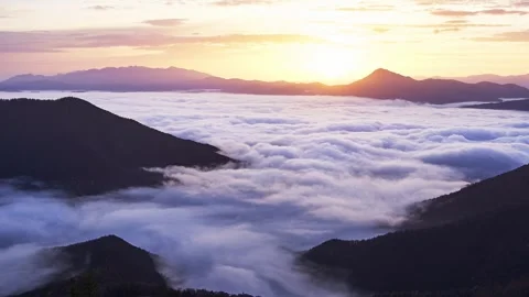 Mountain landscape in the morning at sunrise,sea of inversion clouds in the Stock Footage 255371853