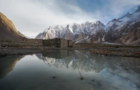 Mountain landscape with reflection on the water Stock Photos