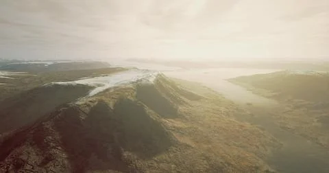 Mountain landscape with river and clouds under bright sky in daylight Illustrazione stock