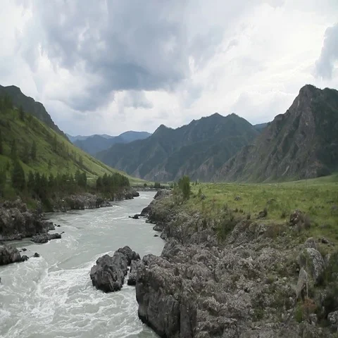 Mountain landscape with a river. The total frame. Sky. Mining Siberia Russia. 스톡 동영상 69442735