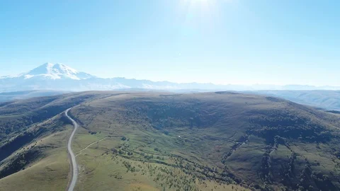 Mountain landscape, road in the mountains, in the distance Elbrus, beautiful Stock Footage 117767775