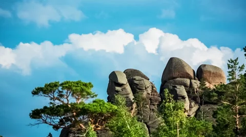 Mountain Landscape,  Running clouds and mountain silhouette of rocks and trees Stock Footage 48571672
