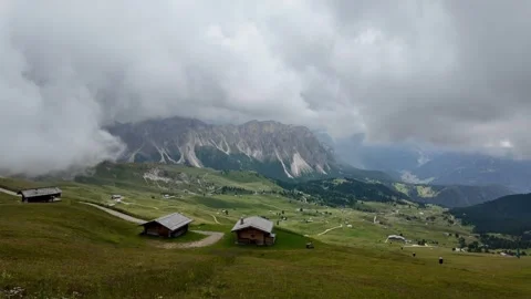 Mountain landscape from Seceda after rainfall, with fast-moving clouds covering Vidéo 345024728