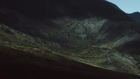 Mountain landscape with shadows and light during twilight hours Stock Footage 345064173