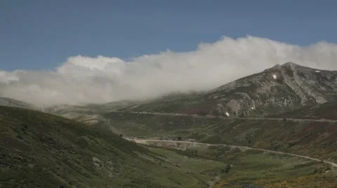 Mountain landscape with ski resort in background with snow and clouds Stock Footage 52128713