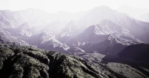 Mountain landscape with soft light at dawn showcasing rugged terrain Stock Illustration