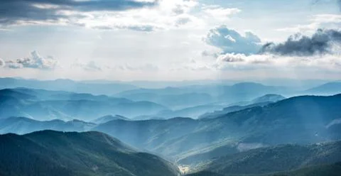 Mountain landscape with sun beams Stock Photos