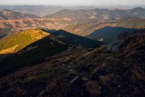 Mountain Landscape at Sunset with Shadows Stock Photos