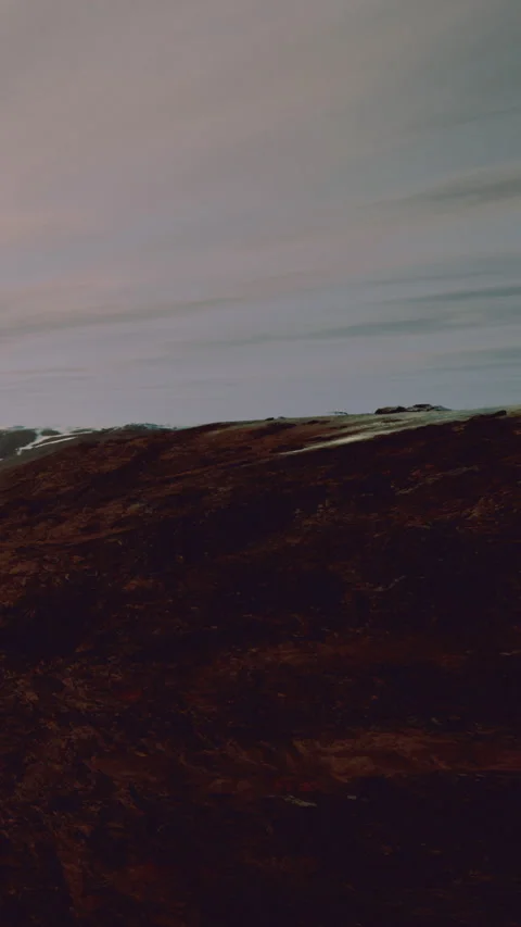 Mountain landscape with sunset view and calm water reflecting sky Stock Footage 339952237