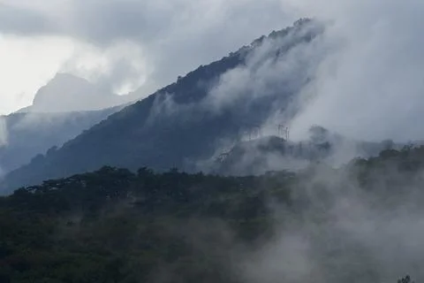 Mountain landscape with thick clouds after rain. Stock Photos