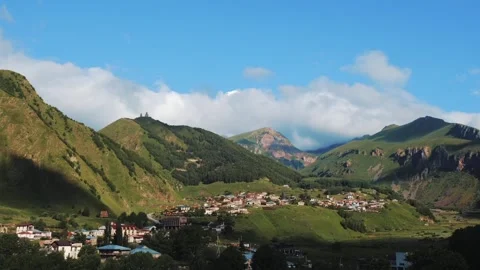 Mountain landscape timelapse. Mount Kazbegi and running clouds, Stepantsminda Stock Footage 246587306