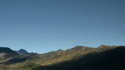 Mountain landscape under clear sky in the morning light Stock Footage 345063939