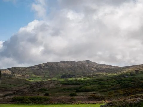 Mountain Landscape Under Dramatic Cloudy Sky Stock Photos