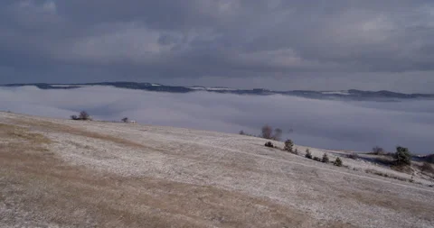 Mountain landscape with valley covered by clouds Stock Footage 147639609