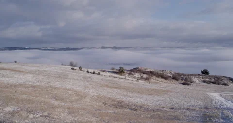Mountain landscape with valley covered by clouds Stock Footage 147639907