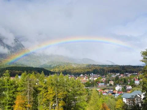 Mountain Landscape with Vibrant Rainbow Stock Photos