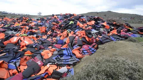 Mountain of Lifejackets left by refugees. Stock Footage 62379018