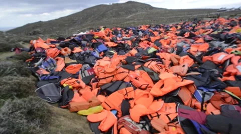 Mountain of Lifejackets left by refugees. Stock Footage 62379131
