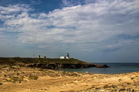 A Mountain Lighthouse Next to a Beach at Cap Angela, Bizerte, Tunisia Stock Photos