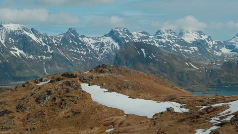 Mountain located in Norway in the spring, filled with both grass and snow. Stock Footage 109372427