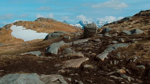 Mountain located in Norway in the spring, filled with both grass and snow. Stock Footage 109372810