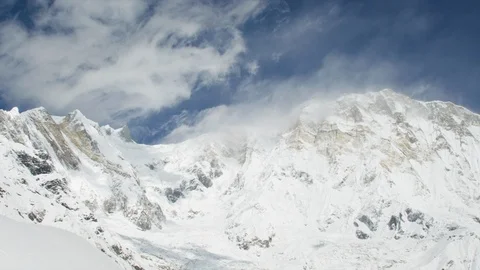 Mountain lodge and snow covered mountain ranges Stock Footage 113255294