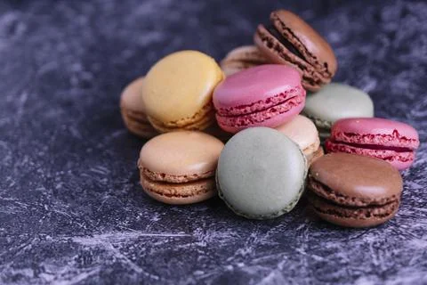 Mountain of macarons of different flavors and colors. Stock Photos