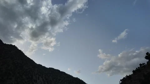 Mountain Majesty Cloudy Mountain Convergence - Timelapse of Dark Clouds Meet Stock Footage 286412667
