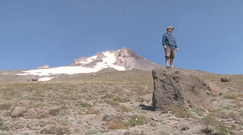 Mountain Man on Boulder Looking Out Stock Footage 41771881