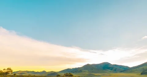 Mountain meadow time-lapse at the summer or autumn sunrise time. Wild nature and Stock Footage 169662112