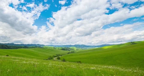 Mountain meadow time-lapse at the summer or autumn time. Wild nature and rural Stock Footage 222501536