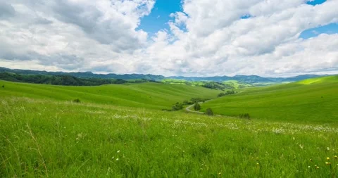 Mountain meadow time-lapse at the summer or autumn time. Wild nature and rural Stock Footage 290443038